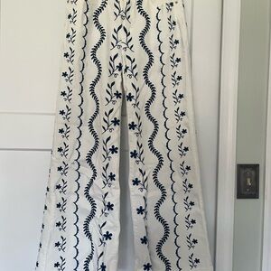 Embroidered White Wide-Leg Jeans with Navy Floral Detail